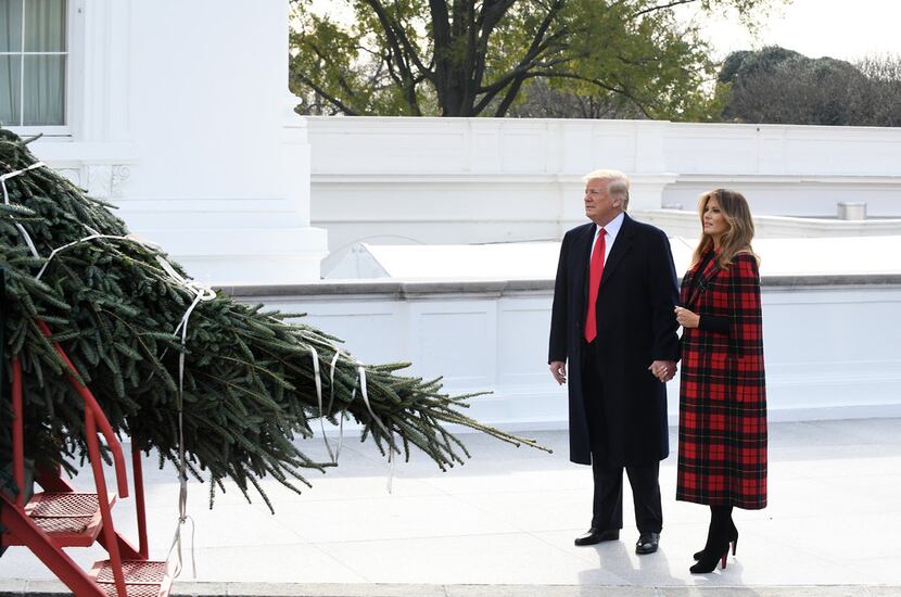 President Donald Trump, seen here with first lady Melania Trump, has said the new NAFTA deal...