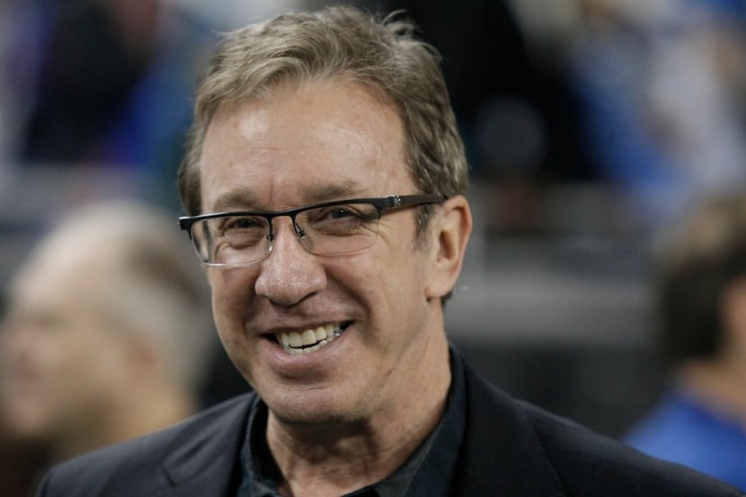 FILE - In this Nov. 27, 2014, file photo, comedian Tim Allen is seen on the sidelines before...