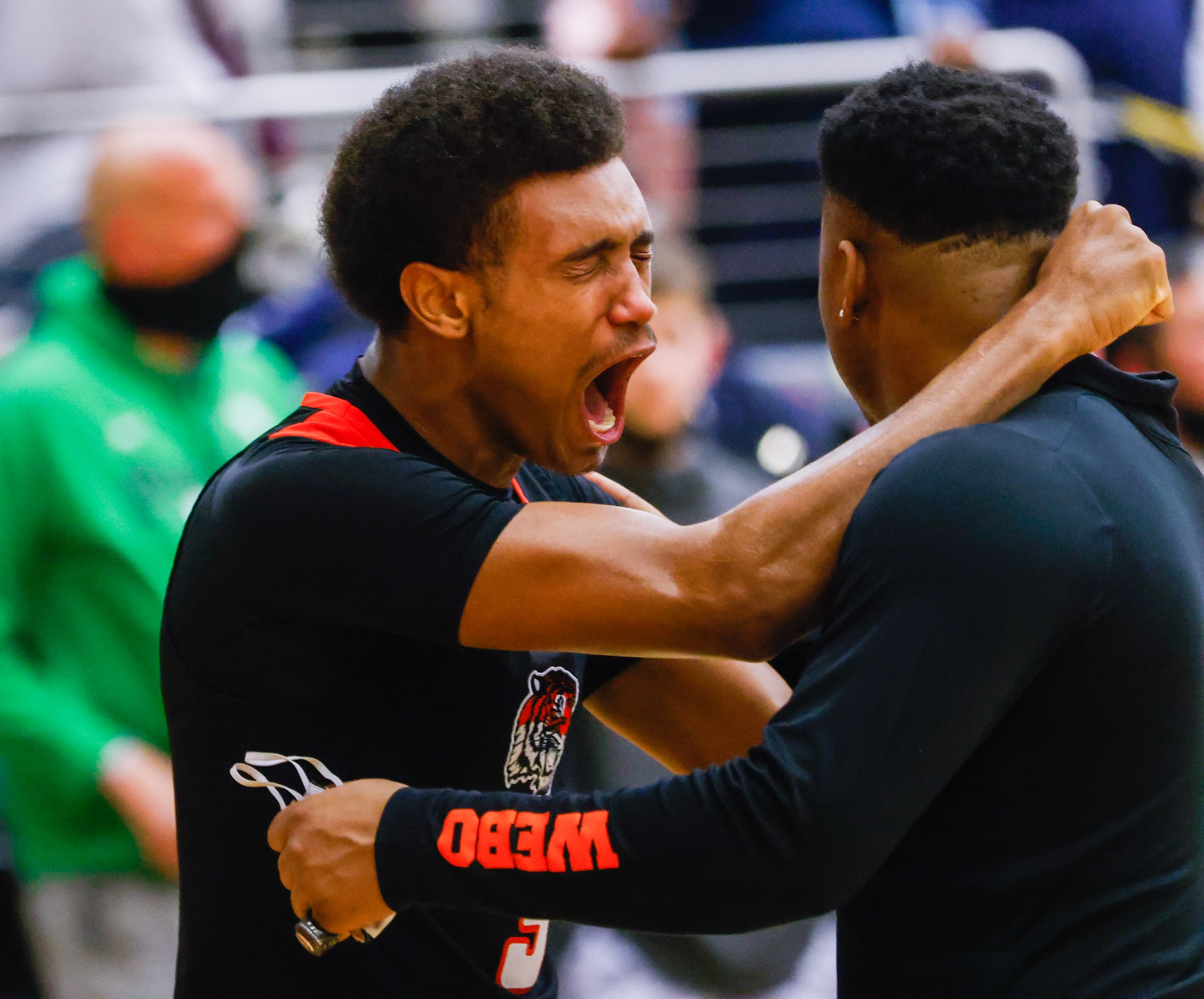 Lancaster's Markies Sykes (3) yells after his team's loss to Kimball following overtime of a...