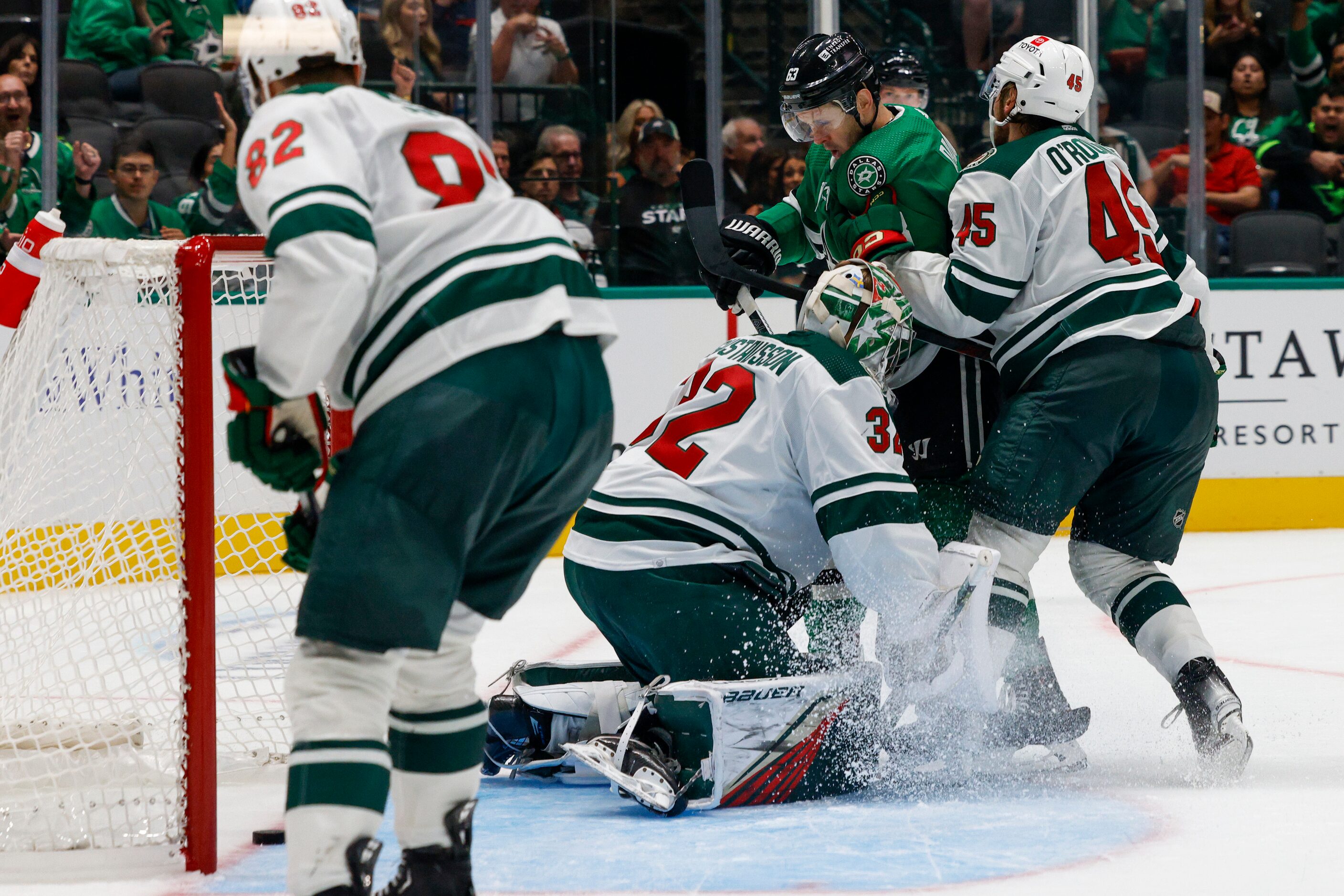 Dallas Stars right wing Evgenii Dadonov (63) scores a goal past Minnesota Wild goaltender...