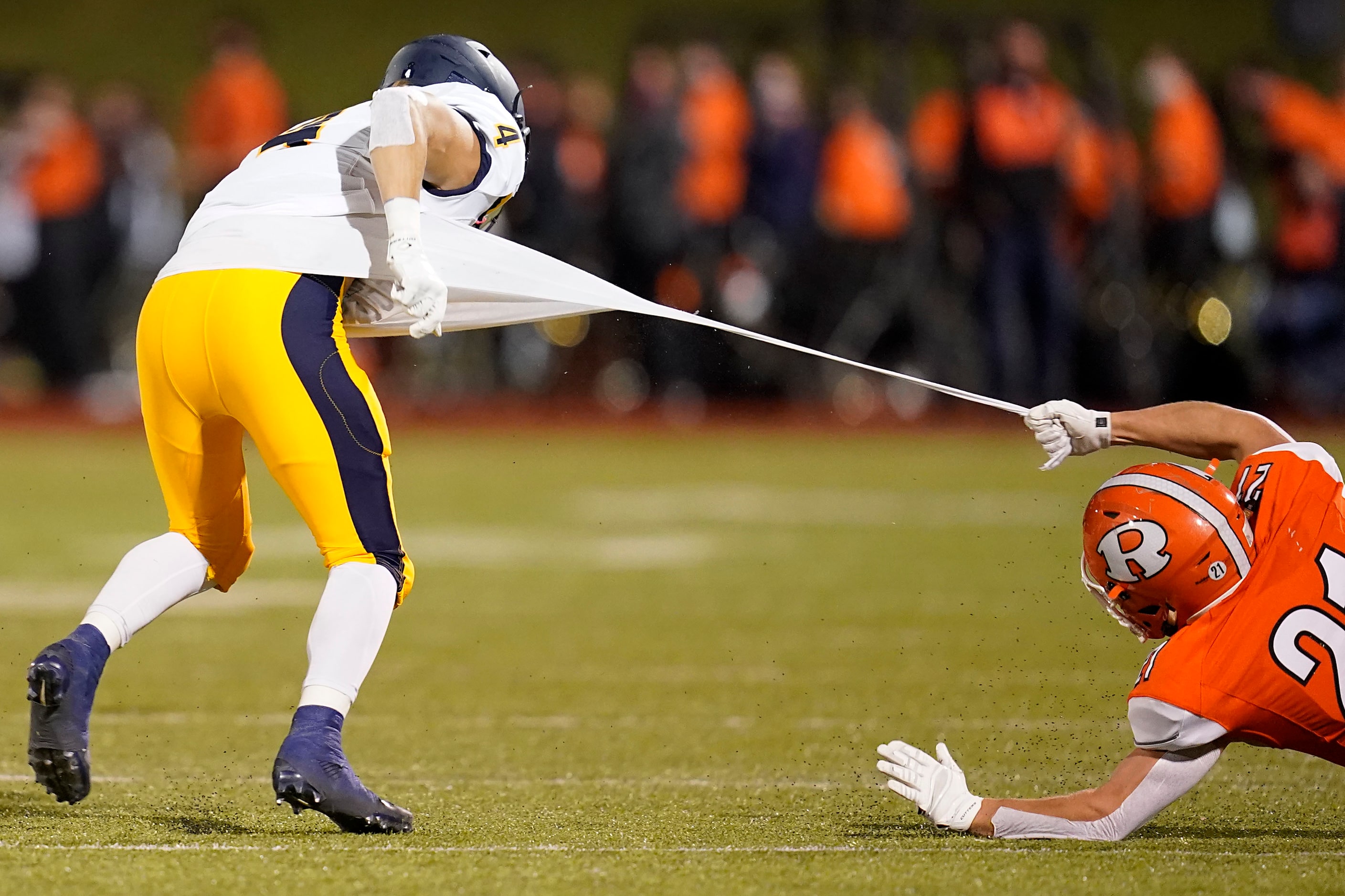 Highland Park wide receiver Crockett Corwin (4) pulls away from Rockwall defensive back Drew...