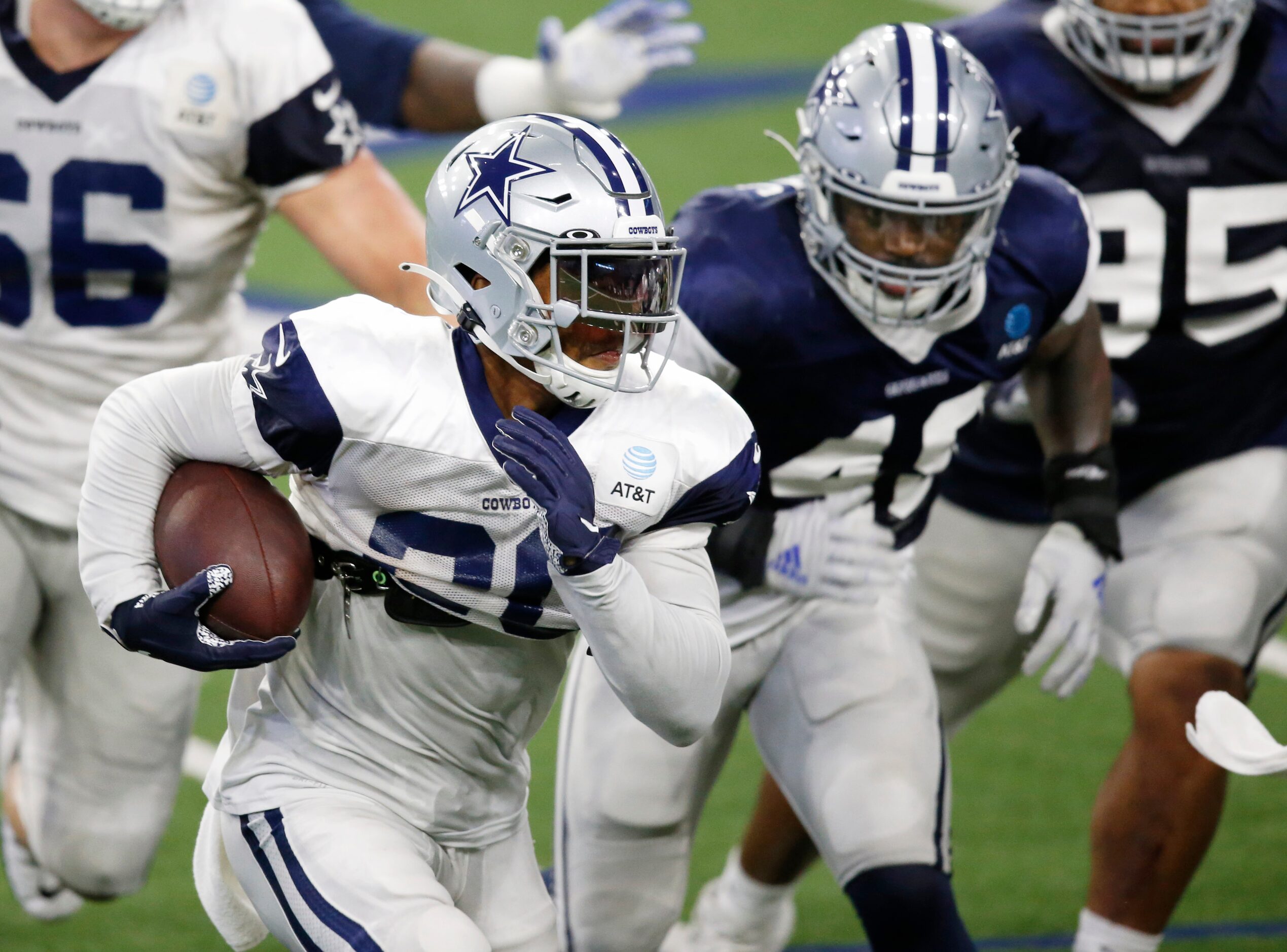 Dallas Cowboys running back Tony Pollard (20) rushes up the field in practice during...