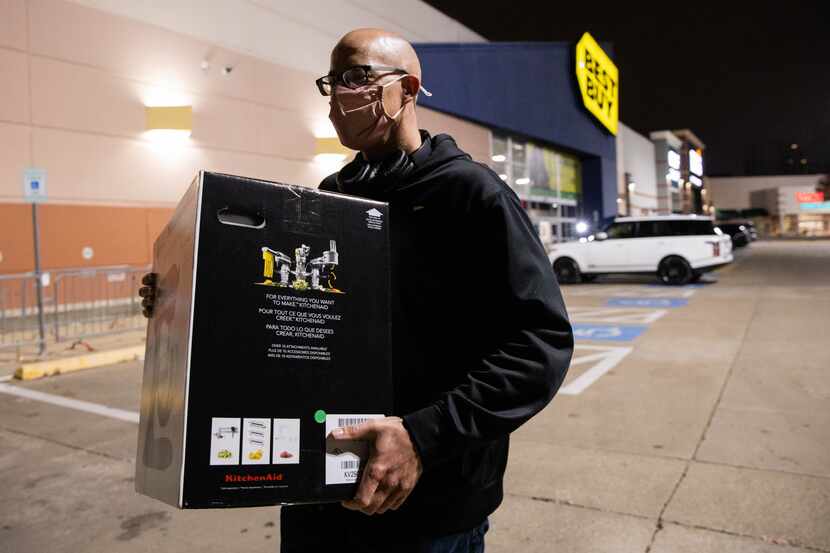 Sean Berube, who was visiting from Arizona, walked out of Best Buy with a KitchenAid mixer...