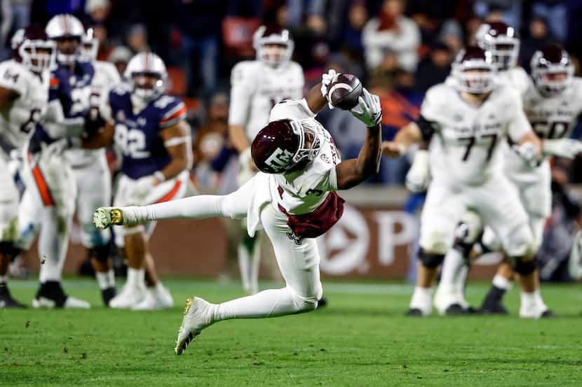 Texas A&M wide receiver Devin Price (3) catches a pass for a first down during the second...