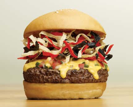 Fuddrucker's Queso Burger is made with the company's signature melted cheese.