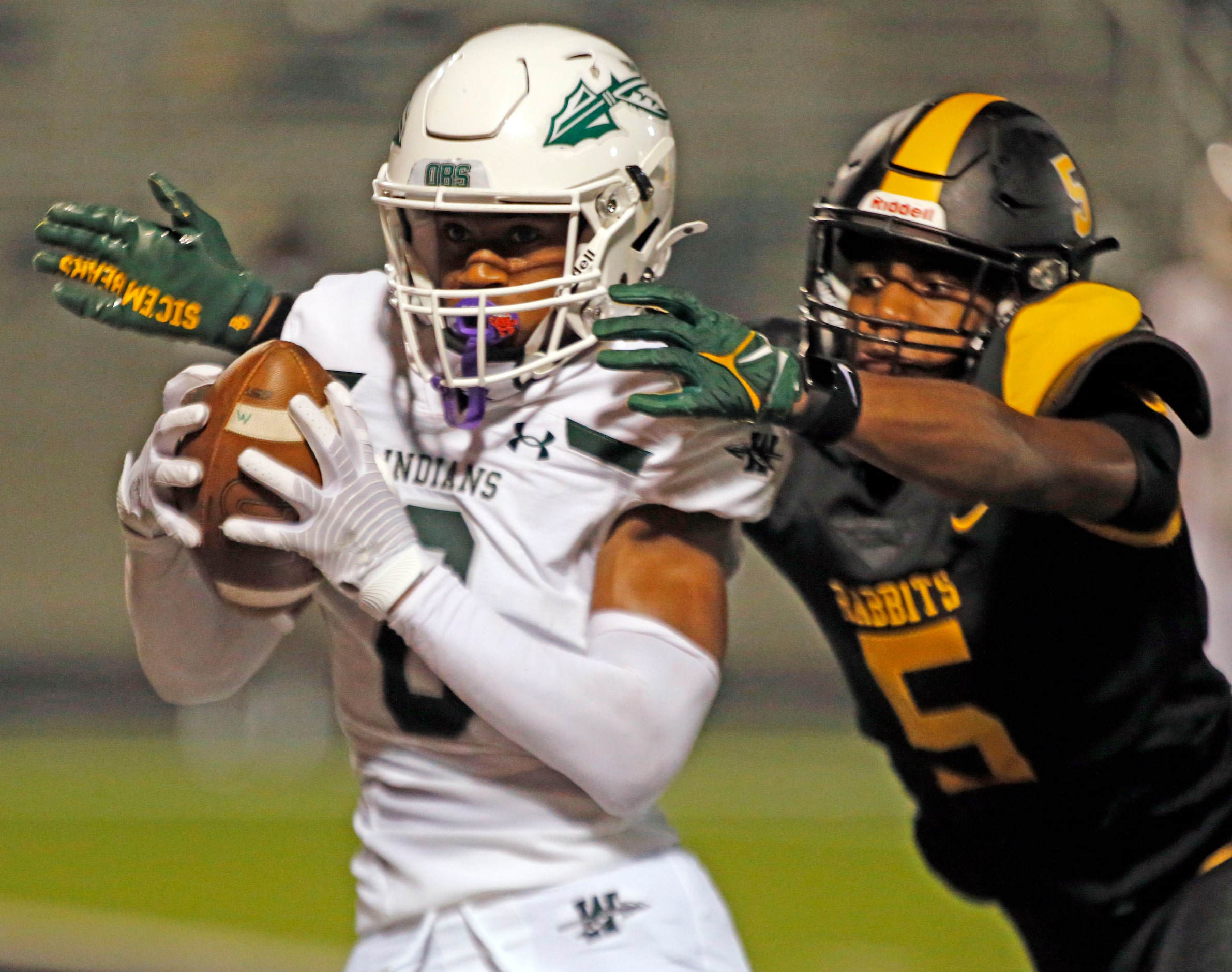 Waxahachie high receiver Kohen Brown (8) grabs a touchdown pass, as Forney high’s Cadon Webb...