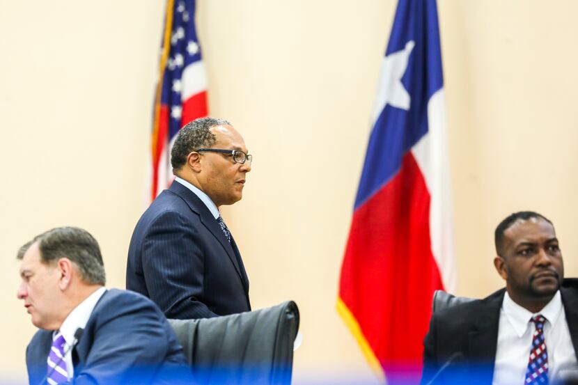 Dallas City Council member Kevin Felder, center, during a Dallas City Council meeting held...