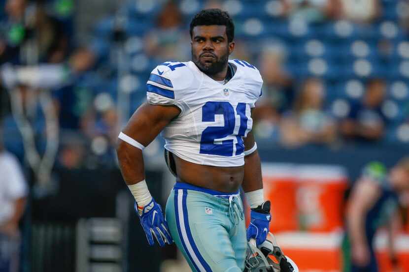 SEATTLE, WA - AUGUST 25:  Running back Ezekiel Elliott #21 of the Dallas Cowboys looks on...