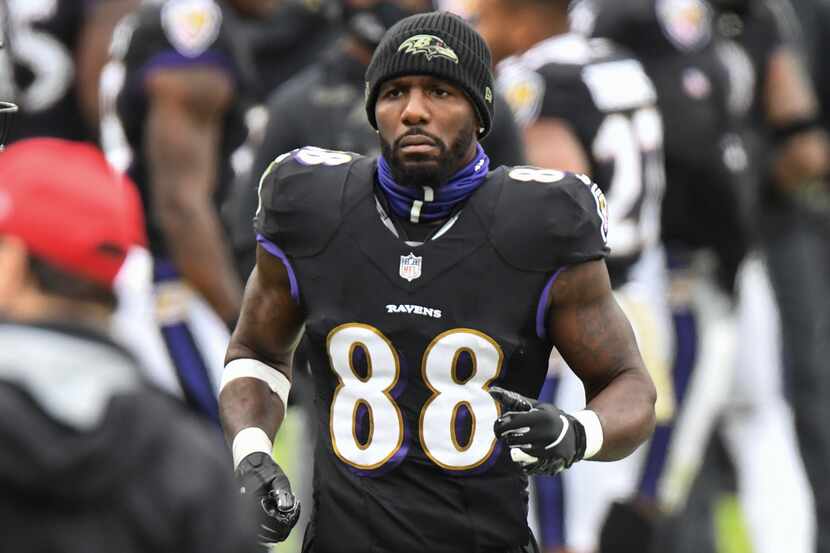 Baltimore Ravens wide receiver Dez Bryant (88) jogs along the sideline during the first half...