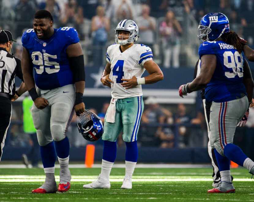 Dallas Cowboys quarterback Dak Prescott (4) watches as New York Giants defensive tackle...