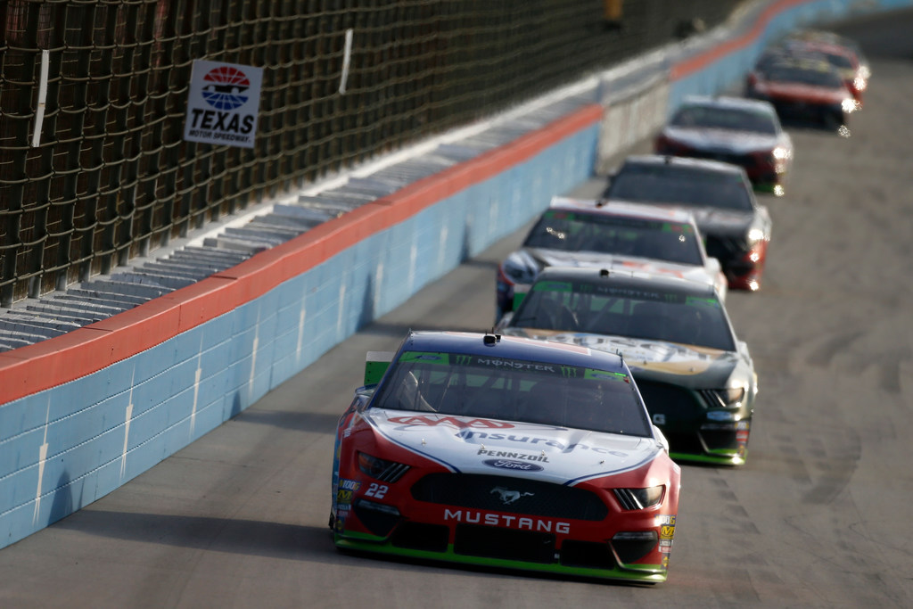 FORT WORTH, TEXAS - NOVEMBER 03: Joey Logano, driver of the #22 AAA Insurance Ford, leads a...