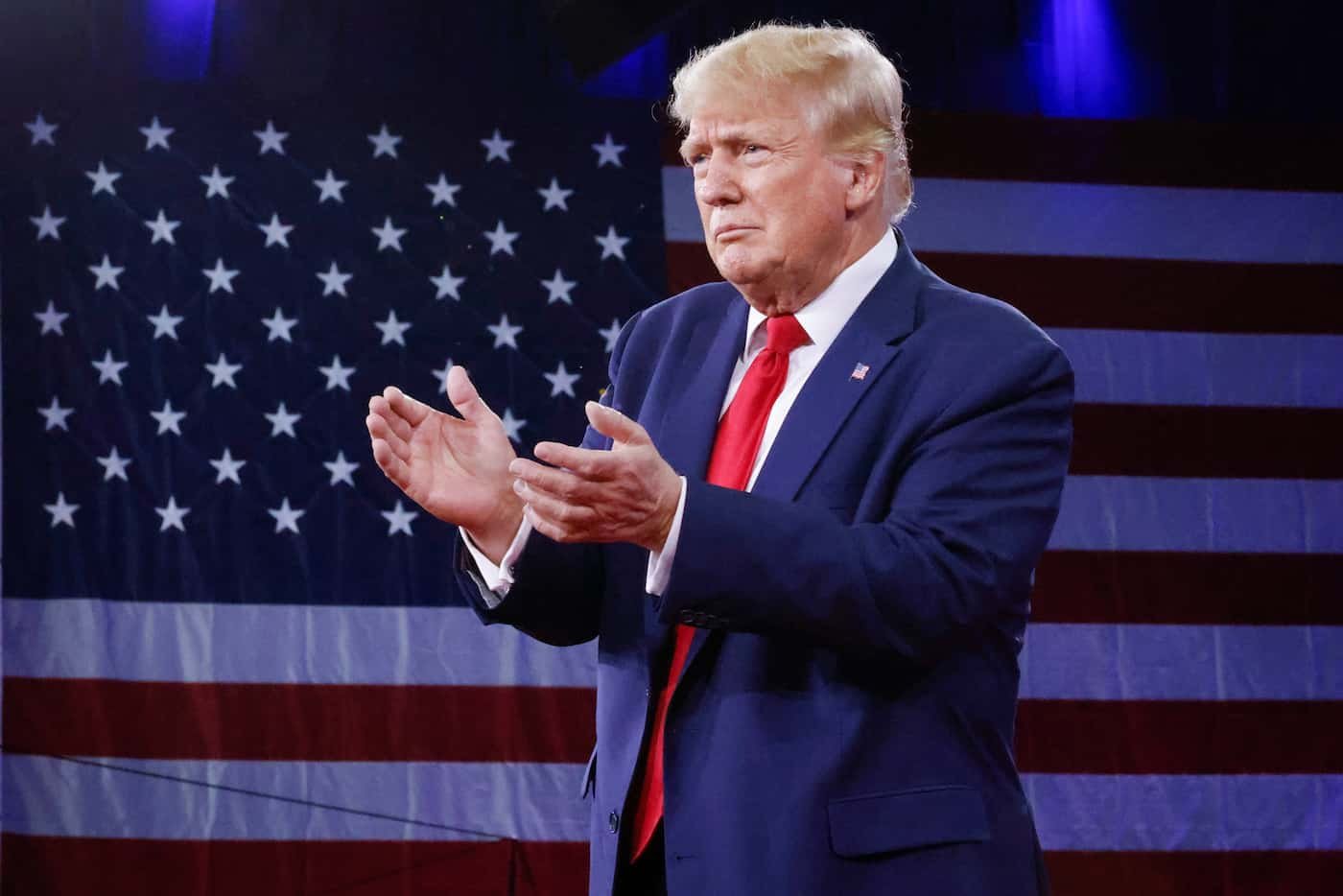 Former President Donald Trump claps during the final remarks during Conservative Political...