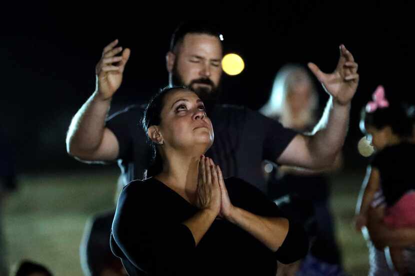 Mourners attended a vigil Monday for victims of Sunday's mass shooting at First Baptist...