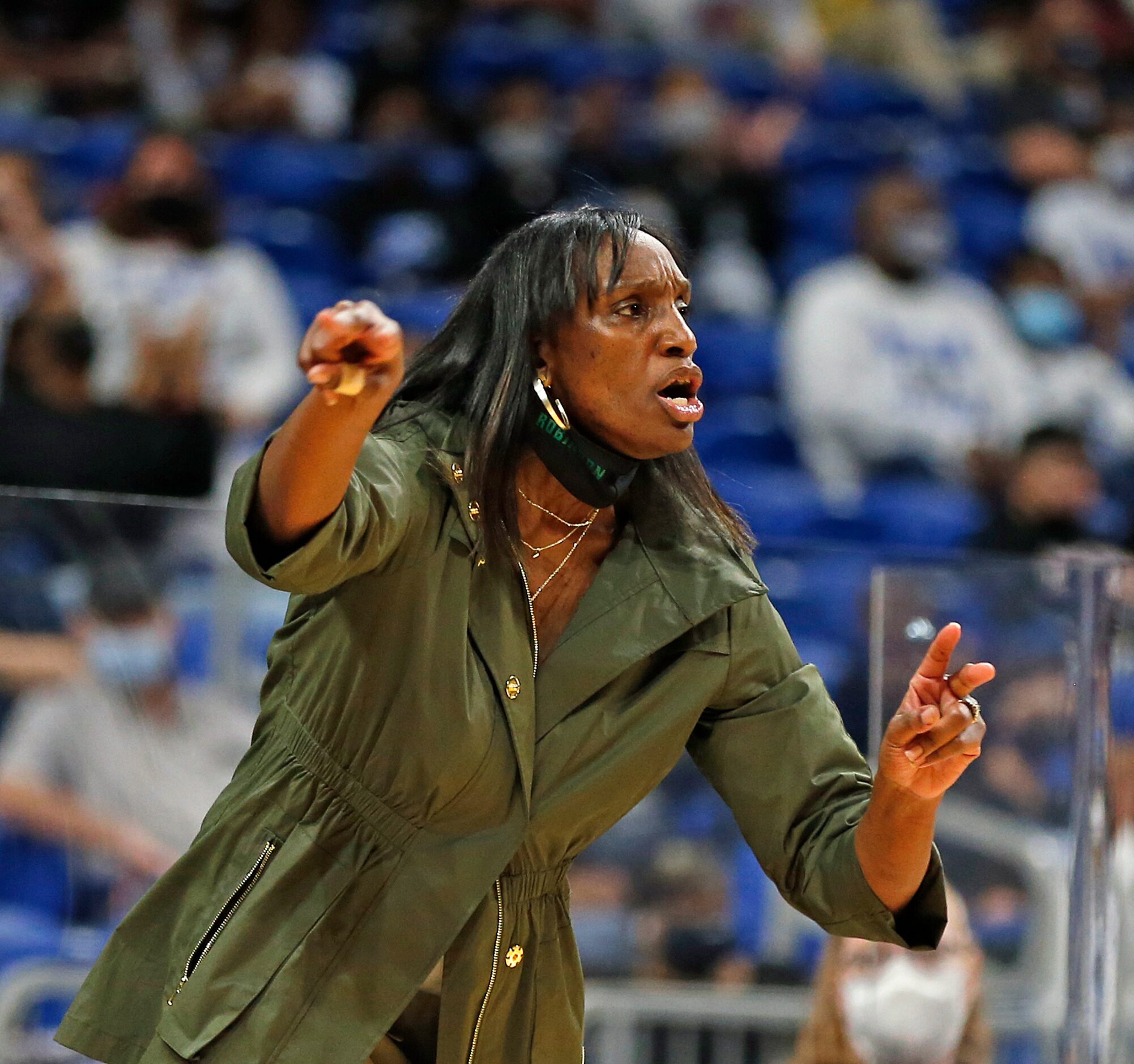 DeSoto head coach Andrea Robinson gives her team instruction. DeSoto vs. Cypress Creek girls...