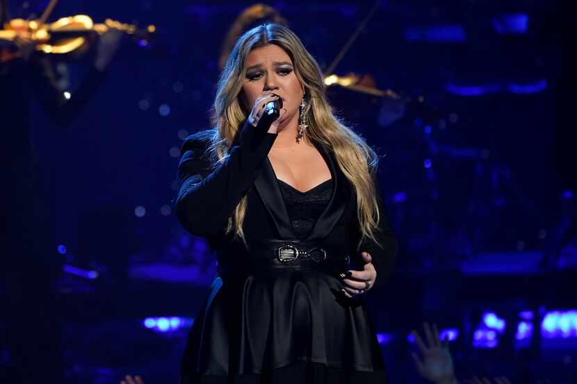 Kelly Clarkson performs during a tribute to Icon award winner Pink at the iHeartRadio Music...