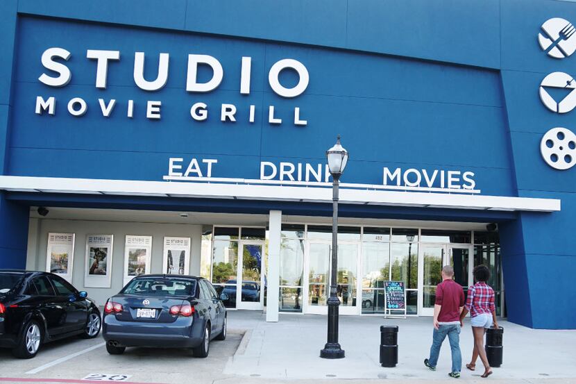 Moviegoers head into Studio Movie Grill in Arlington on Aug. 31, 2017. The nine-screen...