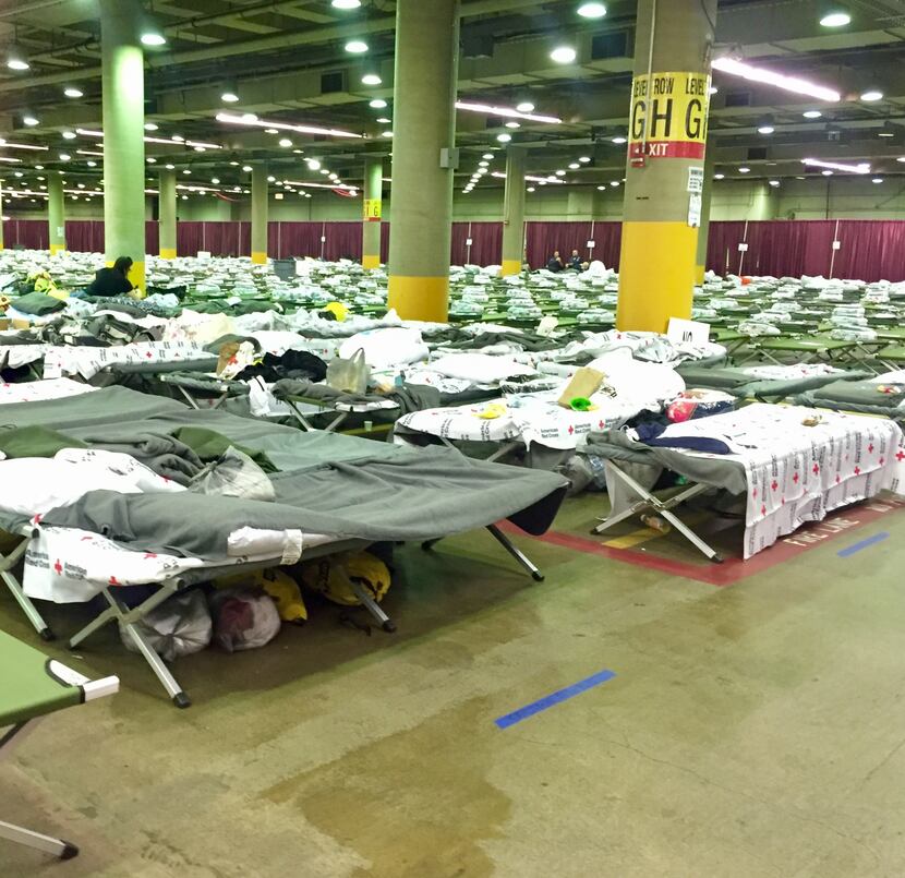 Harvey evacuees have made temporary homes on cots at the Kay Bailey Hutchison Convention...