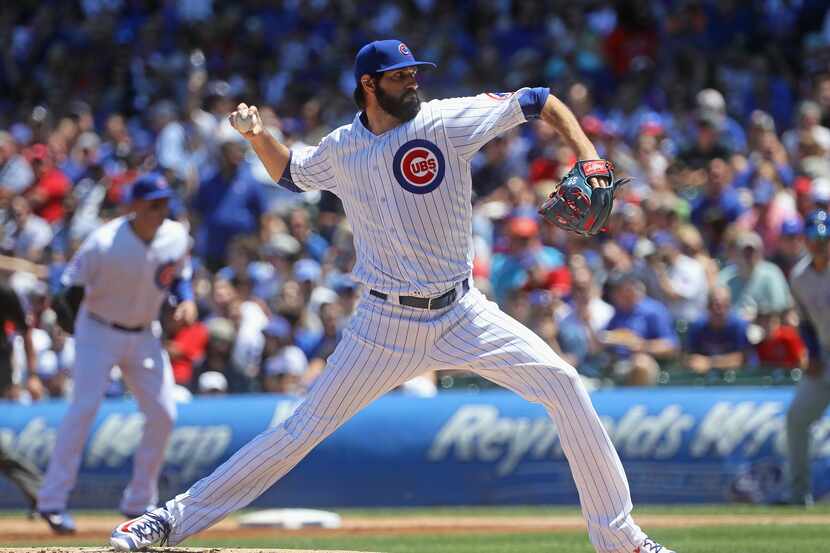 CHICAGO, IL - JULY 16:  Starting pitcher Jason Hammel #39 of the Chicago Cubs delivers the...