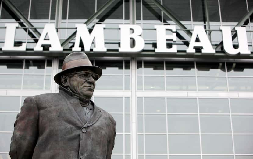 A statue of Vince Lombardi stands in front of Lambeau Field in Green Bay, on January 25,...