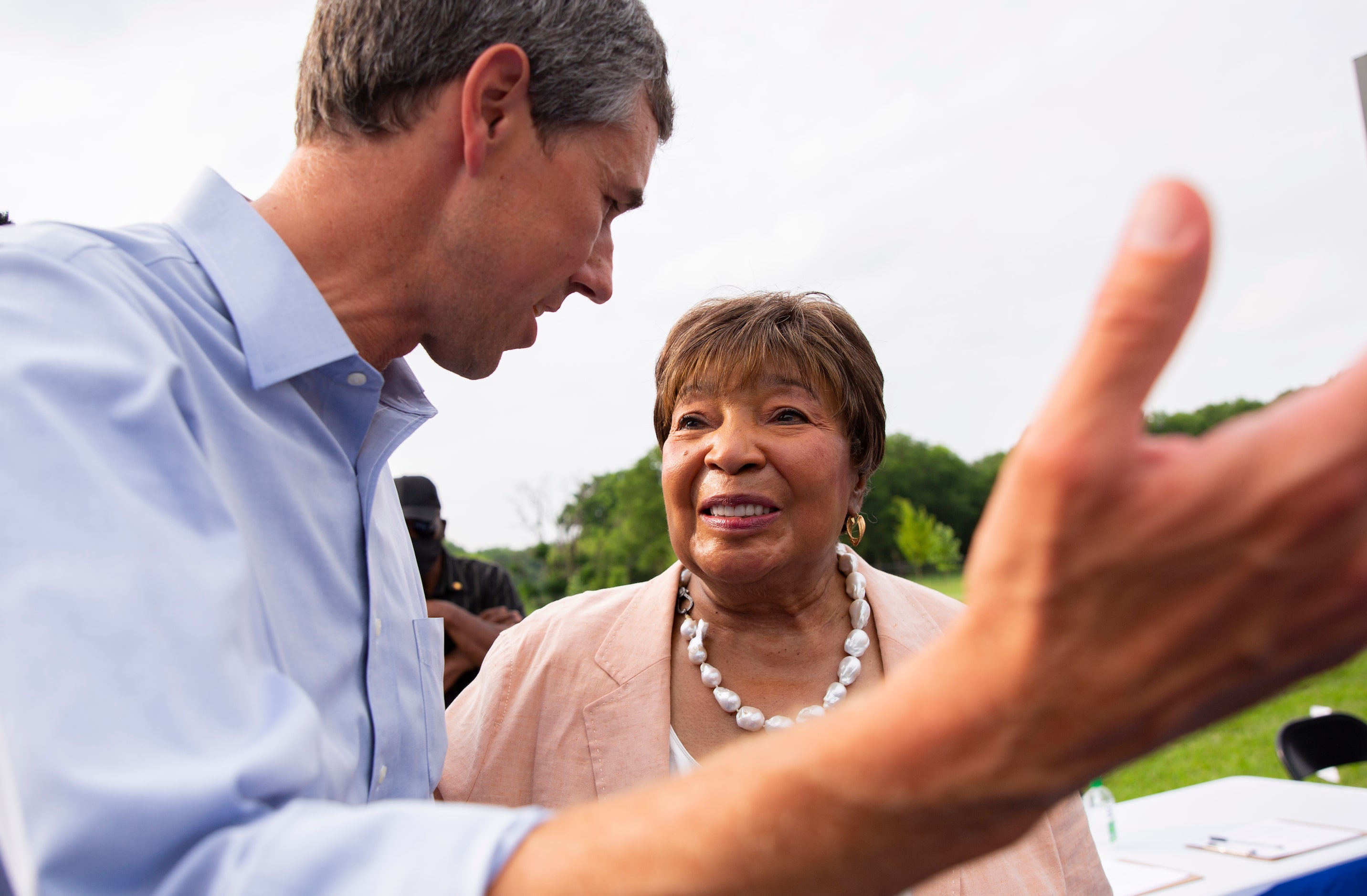 Former congressman Beto O'Rourke speaks to U.S. Rep. Eddie Bernice Johnson before the start...