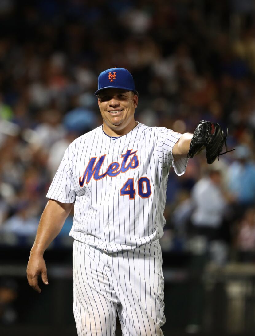 Bartolo Colon  of the New York Mets leaves the game in the seventh inning against the...
