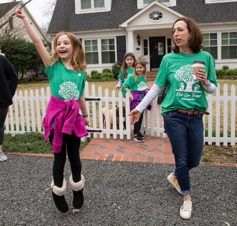 Violet Brister, 8, tried to lure more customers to the Kids Luv Trees lemonade stand...