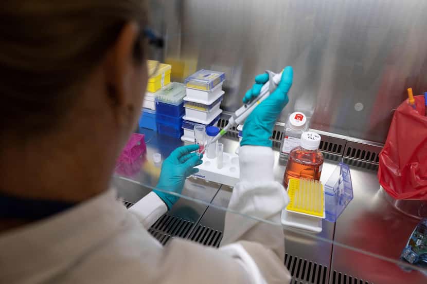 A researcher works in an oncology laboratory in September, 2022. (Photo by Thomas SAMSON /...