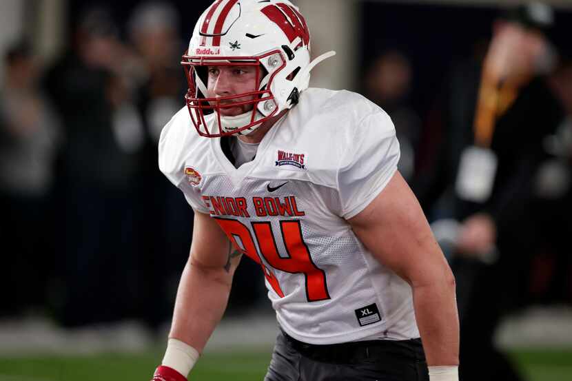 National Team tight end Jake Ferguson of Wisconsin (84) runs through drills during practice...