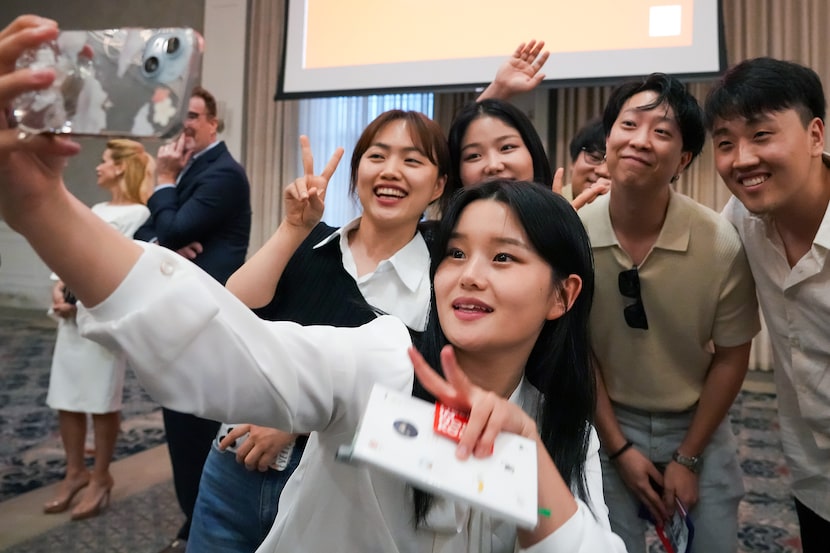 Lily Jo takes a selfie with fellow North Korean refugees Grace Kang (left) and Bella  Ha...