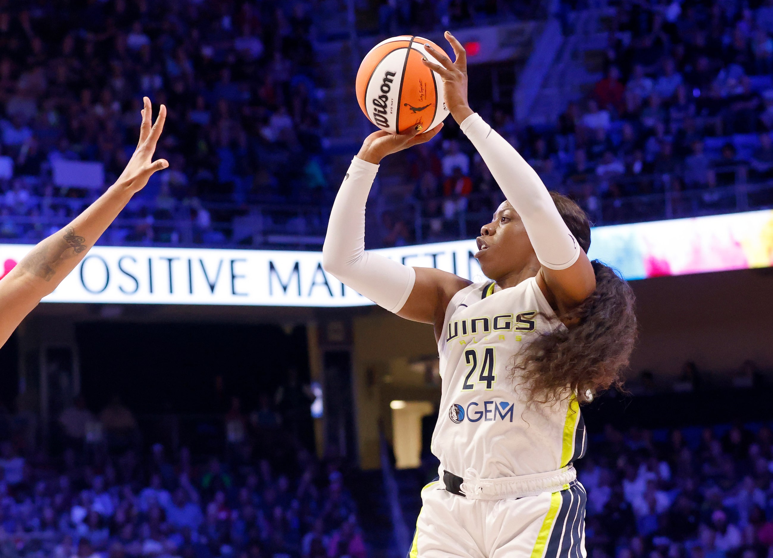 Dallas Wings guard Arike Ogunbowale (24) takes a second half shot against the Indiana Fever...