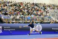 Tommy Paul of the U.S. stretches to play a forehand during the second set of the ATP Dallas...