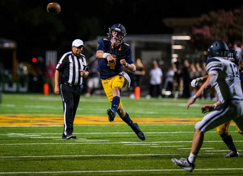 Highland Park quarterback Chandler Morris (4) throws a pass during the second half of a high...