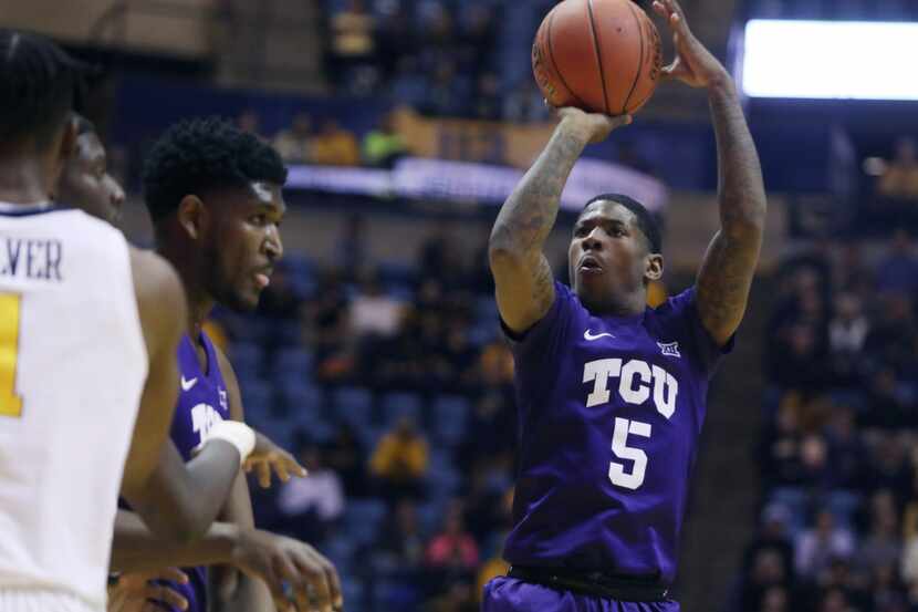 TCU guard Kendric Davis (5) shoots against the West Virginia defense during the first half...