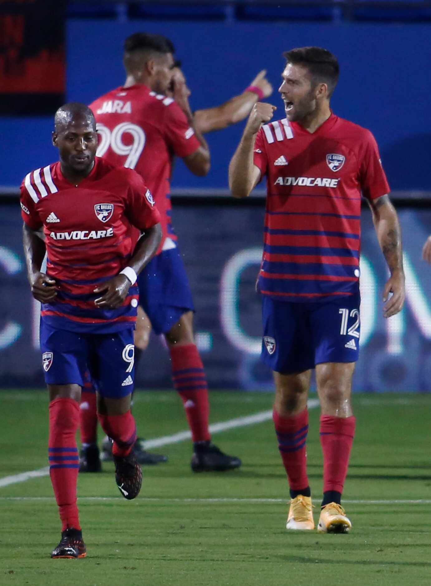 FC Dallas' Ryan Hollingshead, (12) pumps his fist as he reacts to fans as teammate Fafa...