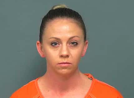 FILE - This file photo provided by the Mesquite Police Department shows Amber Guyger, taken...