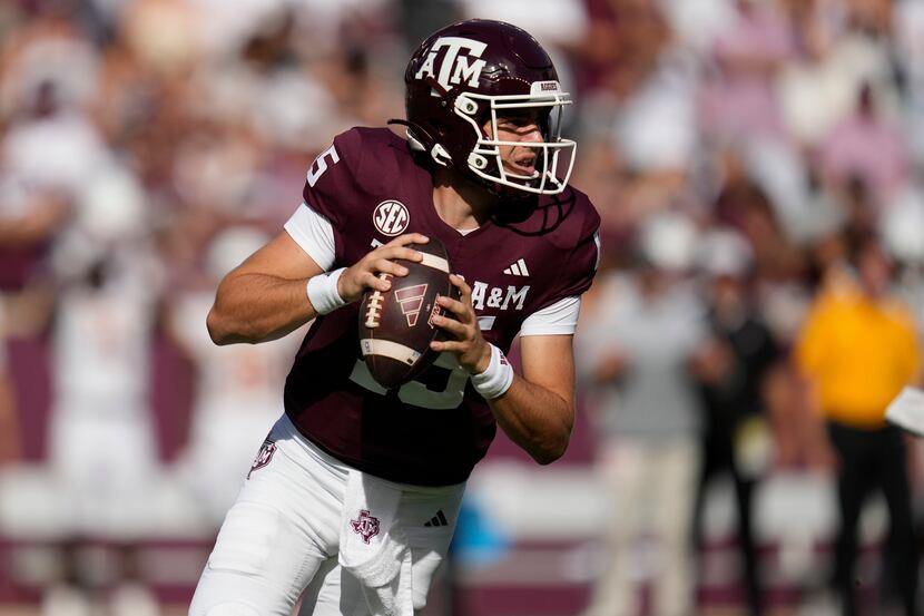 Texas A&M quarterback Conner Weigman (15) looks to pass against Louisiana-Monroe during the...