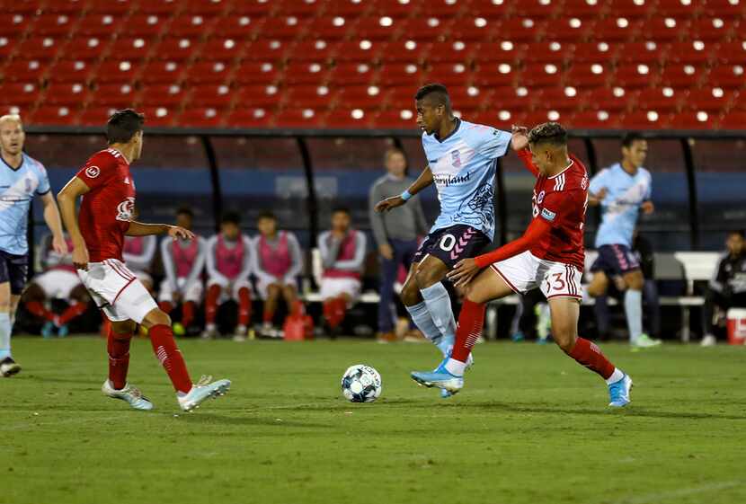 Edwin Cerrillo (33) defenders against Dan Tenorio of Forward Madison in the North Texas SC...