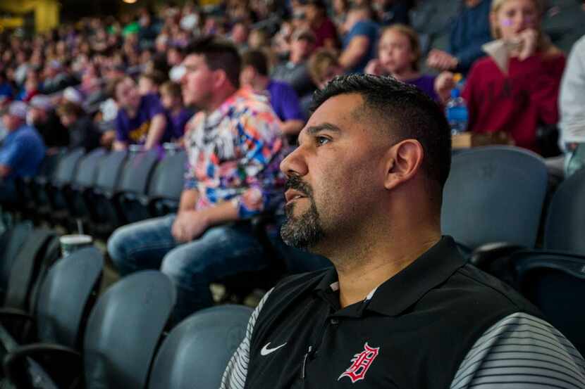 Fort Worth Diamond-Hill Jarvis High School head football coach Oscar Castillo watches the...