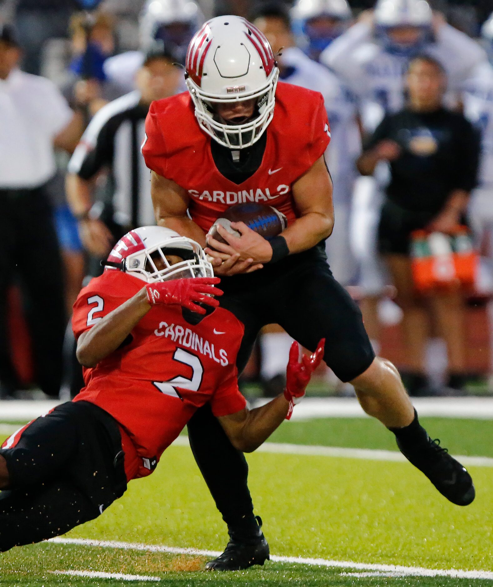 Melissa High School defensive back Damon Youngblood (1) gets his second interception of the...