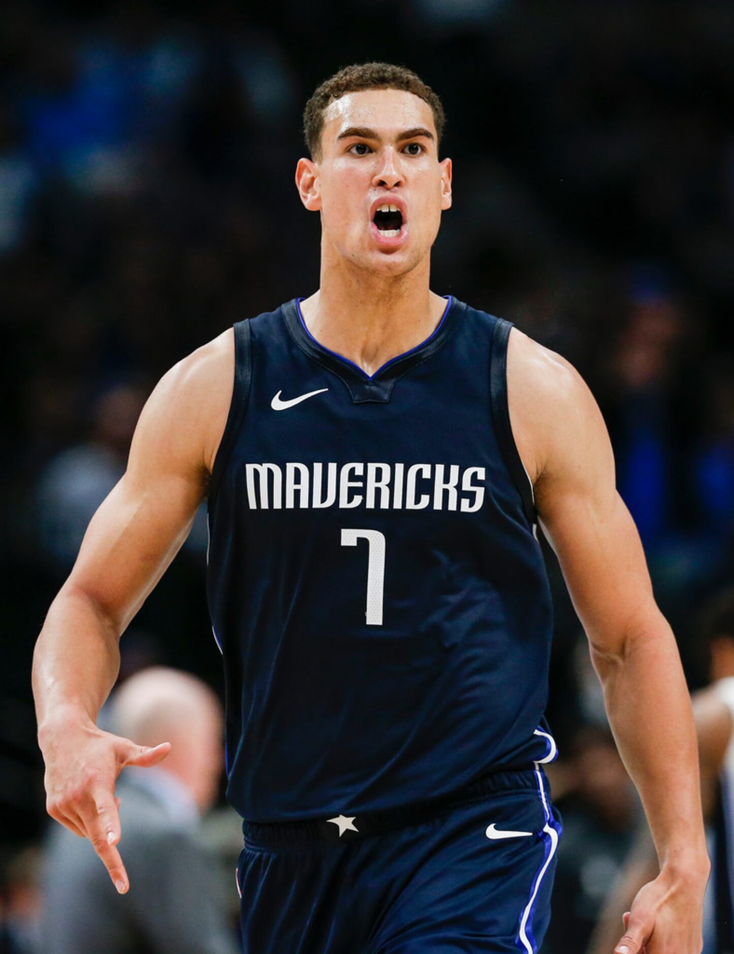 Dallas Mavericks forward Dwight Powell (7) celebrates a play during the fourth quarter of an...