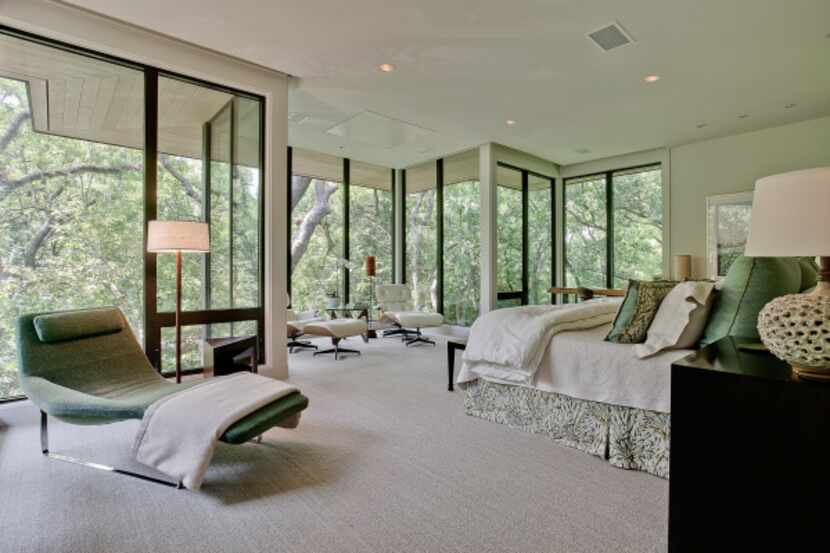 The bedroom of the contemporary tree house at 4626 Watauga Road.
