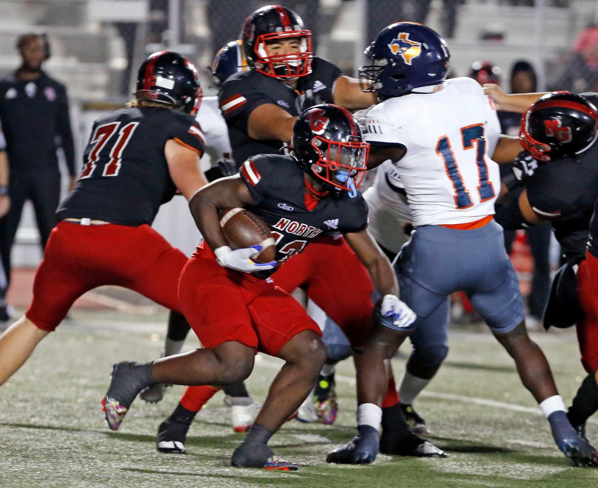 during the first half of a high school football game between/against Sachse High and North...