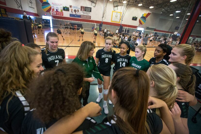 Waxahachie coach Sandy Faussett-Stoops (center), pictured during a match last season, saw...