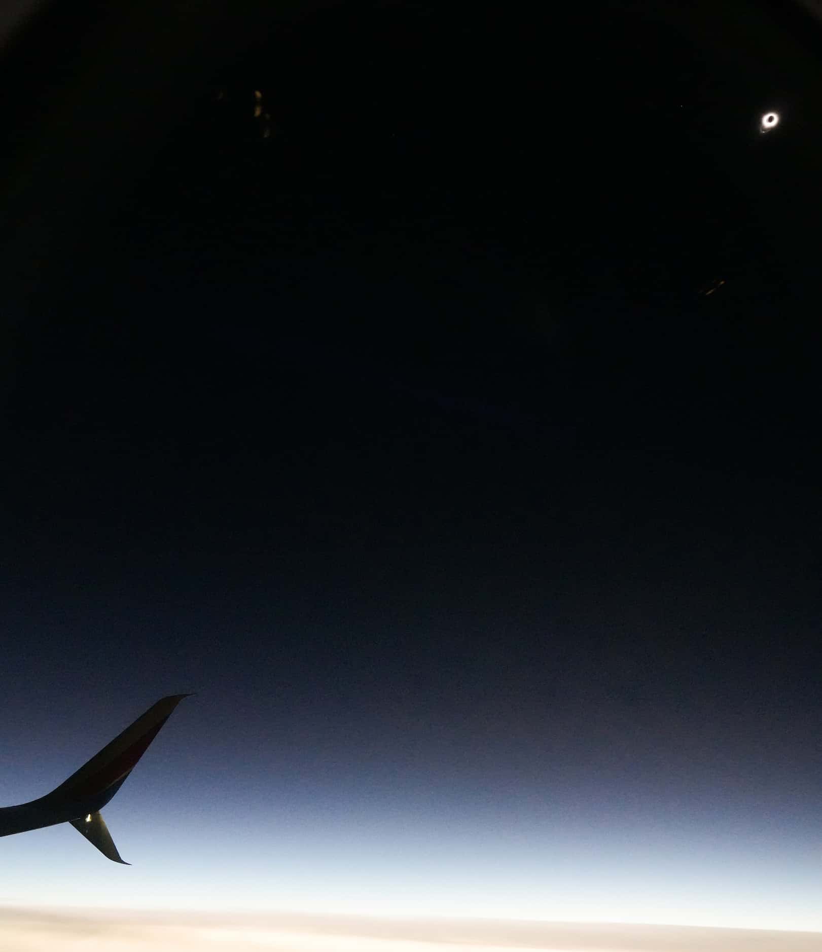 A total solar eclipse is seen from Southwest Airlines flight #1252 from Dallas to Pittsburgh...