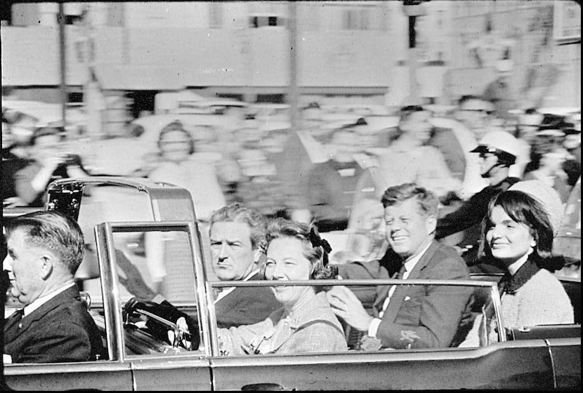 Moments before he was shot and killed, President John F. Kennedy rode with his wife,...