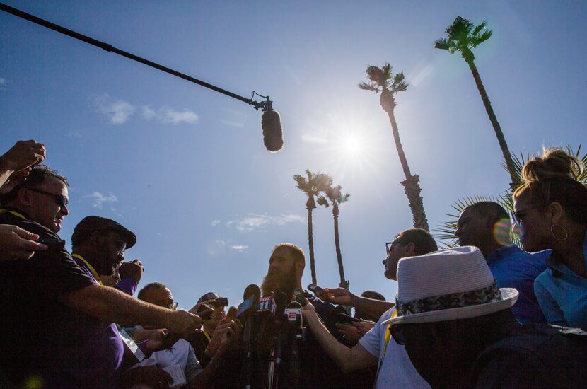 Dallas Cowboys center Travis Frederick (72) talks to reporters as Dallas Cowboys players,...