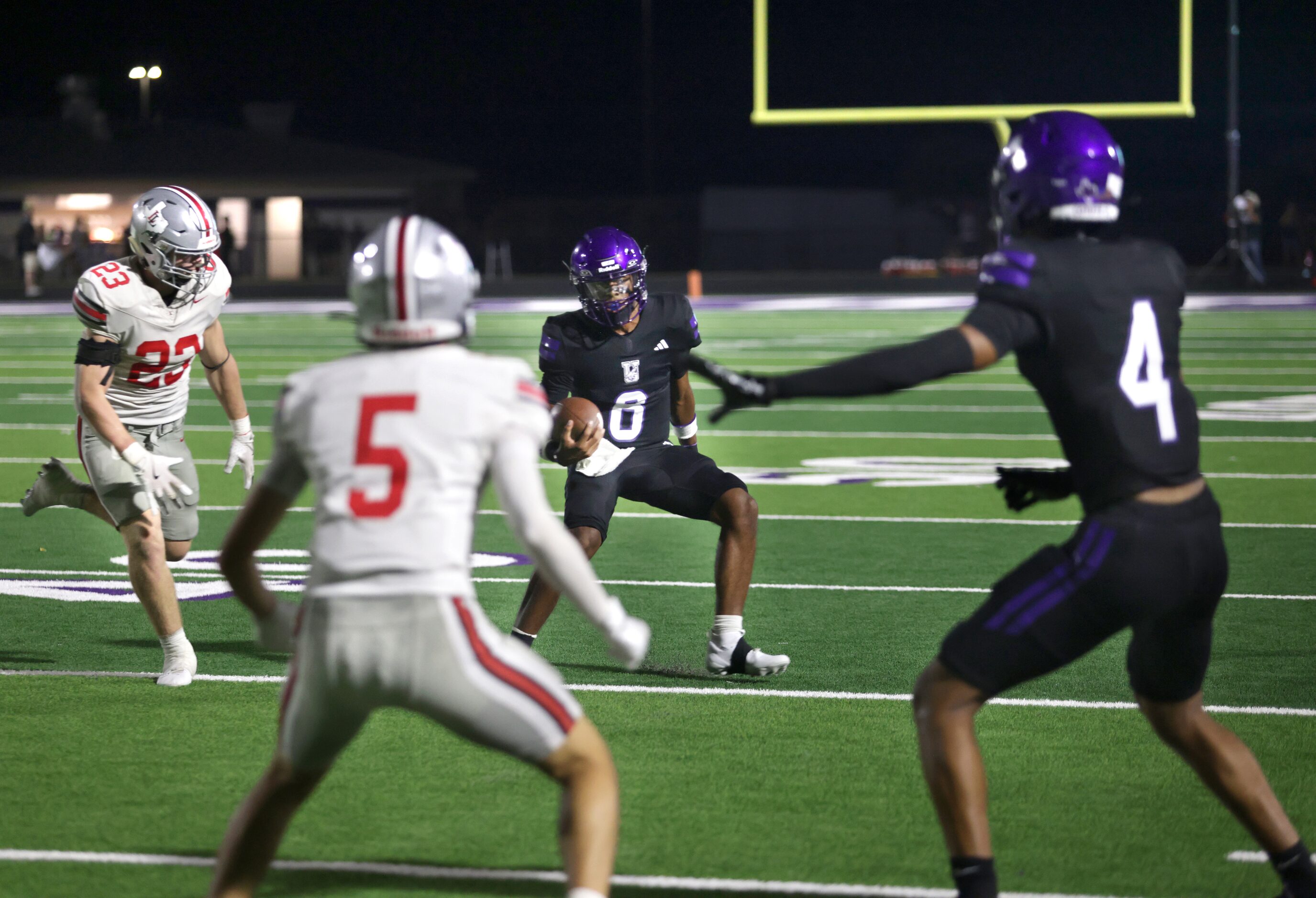 Anna player #8 Ziondre Williams heads out of bounds during the Lovejoy High School at Anna...