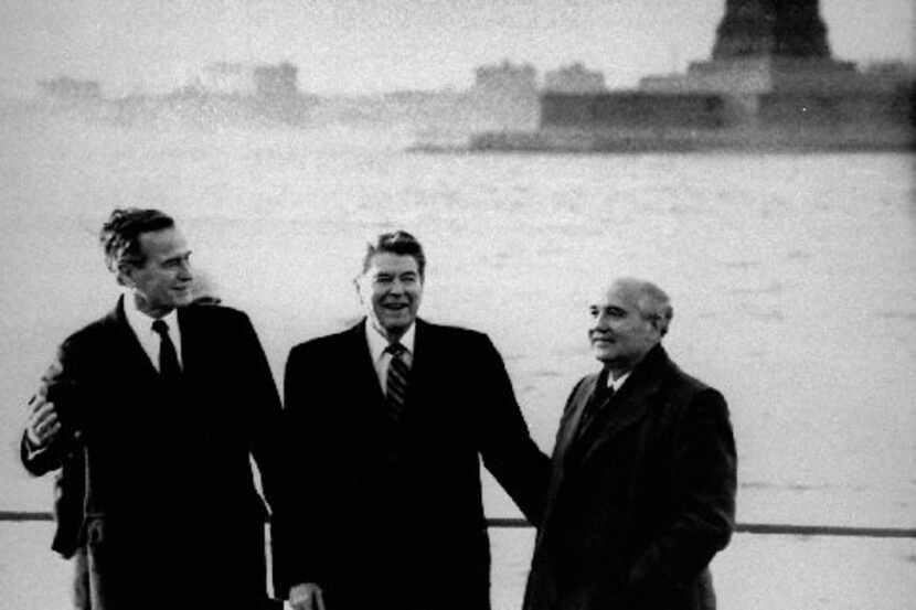President-elect George Bush, President Ronald Reagan and Soviet leader Mikhail Gorbachev met...
