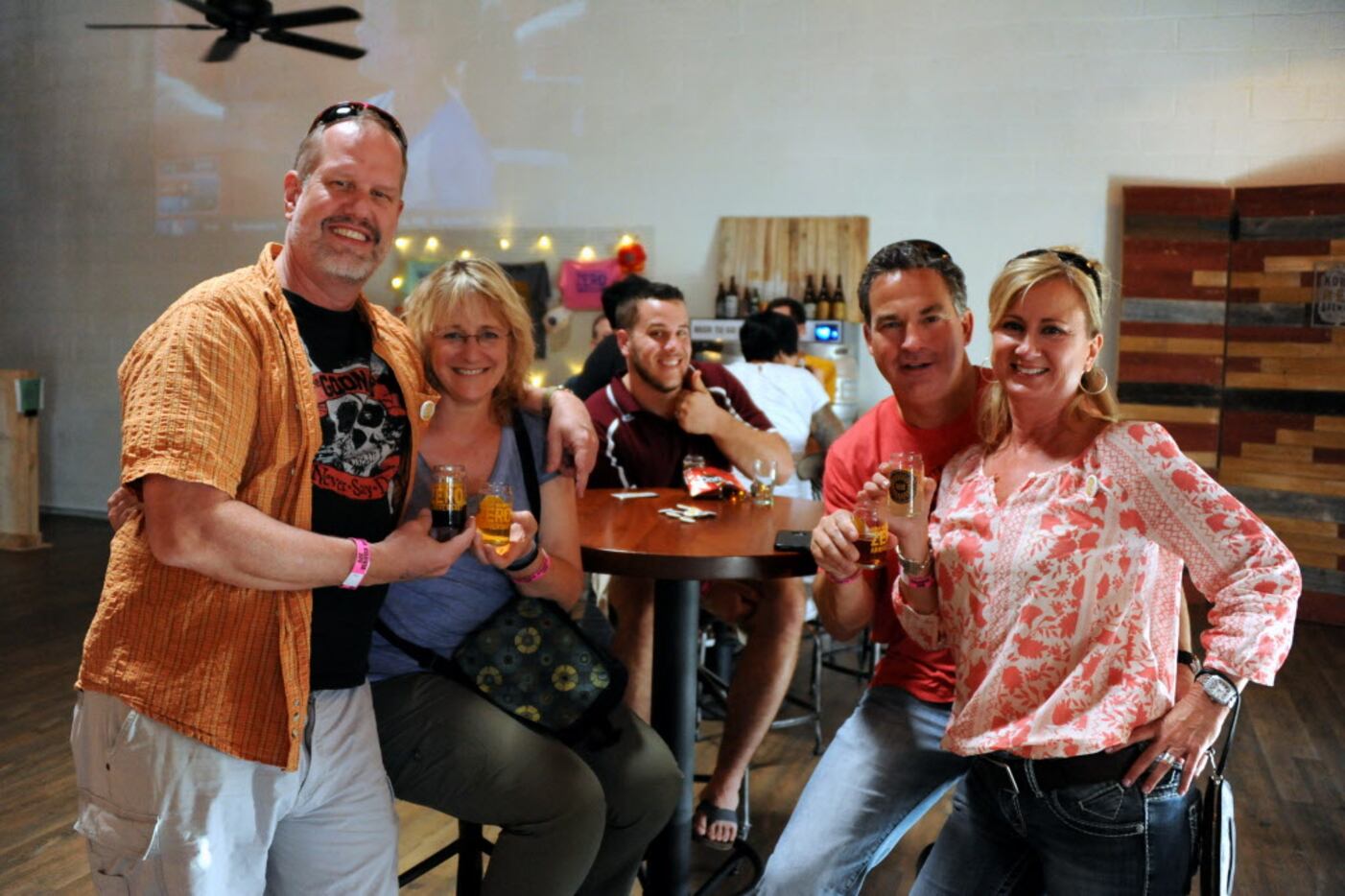 Friends enjoy beer and relaxing at the Zero Anniversary party at Noble Rey Brewing Company...