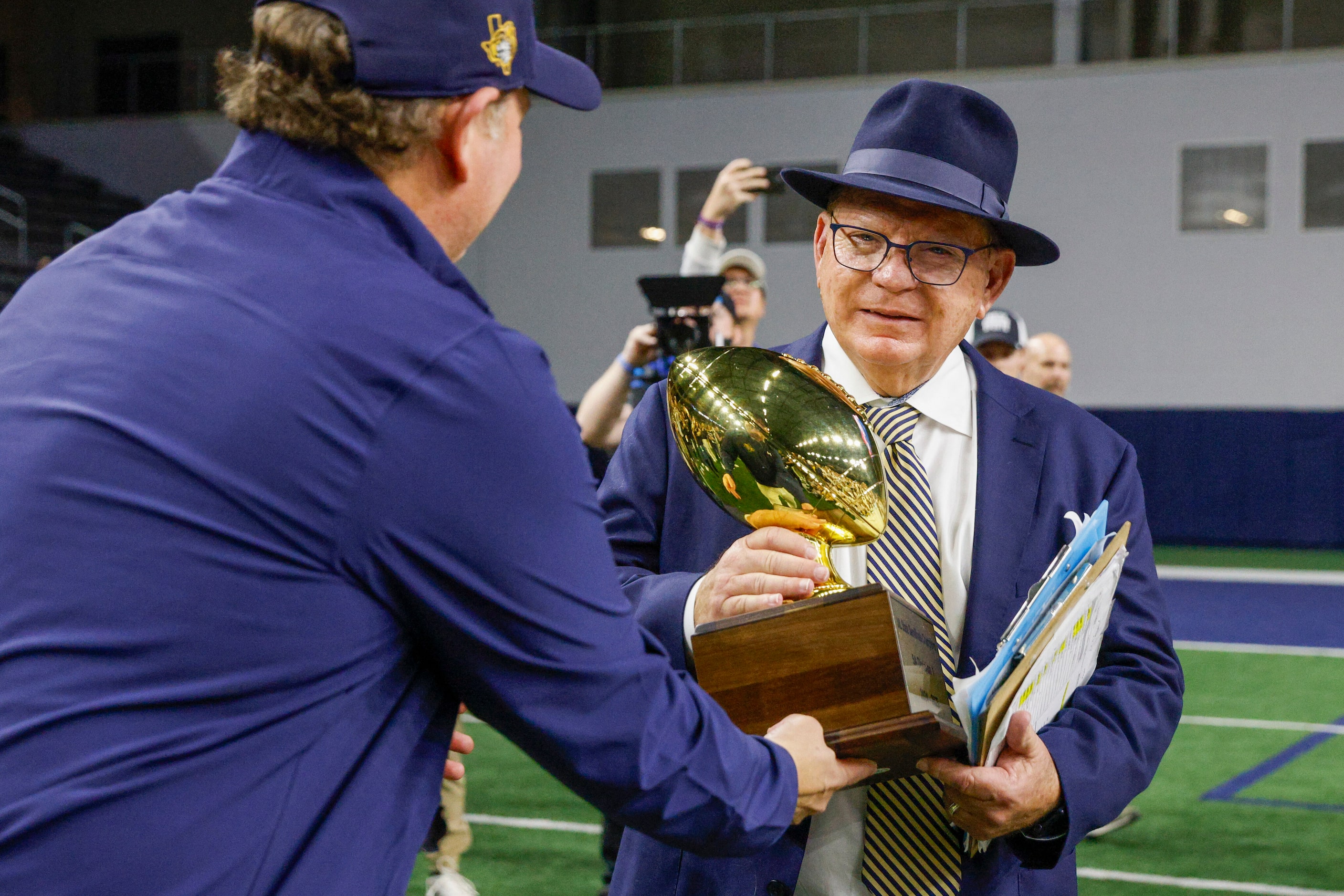 Highland Park head coach Randy Allen accepts a Class 5A Division I state semifinal...